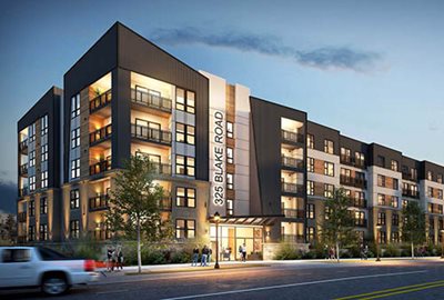 Development adjacent to the Blake Road Station on the METRO Green Line extension has received Livable Communities funding in the past. Now under construction, site plans  include townhouses, four multi-family buildings, and a restaurant pad. Architect’s rendering of the first apartment building under construction near Blake Road Station.