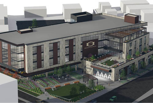 Architect’s rendering of the Bridgewater Bank Corporate Center in St. Louis Park, a redevelopment project that will include an office building, structured parking, retail space, restaurant and public plaza. The Council awarded funding to the project in 2018. A multi-story building with a park area in front.