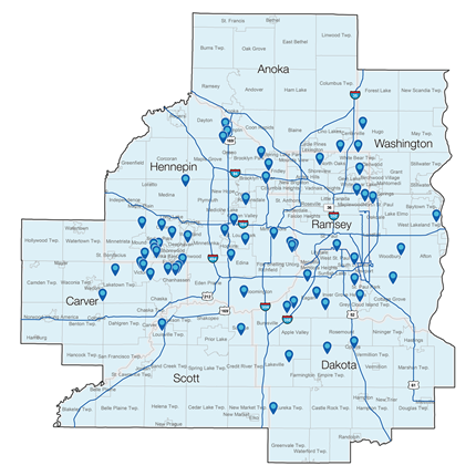 A blue map showing Lift Station communication upgrade locations in the following Minnesota counties: Anoka, Ramsey, Washington, Dakota, Scott, Carver and Hennepin County.  There are 63 sites in 40 different cities.